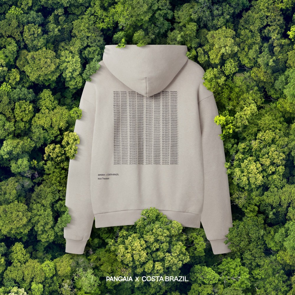 Image may contain Clothing Apparel Bush Vegetation Plant Sweater and Sweatshirt