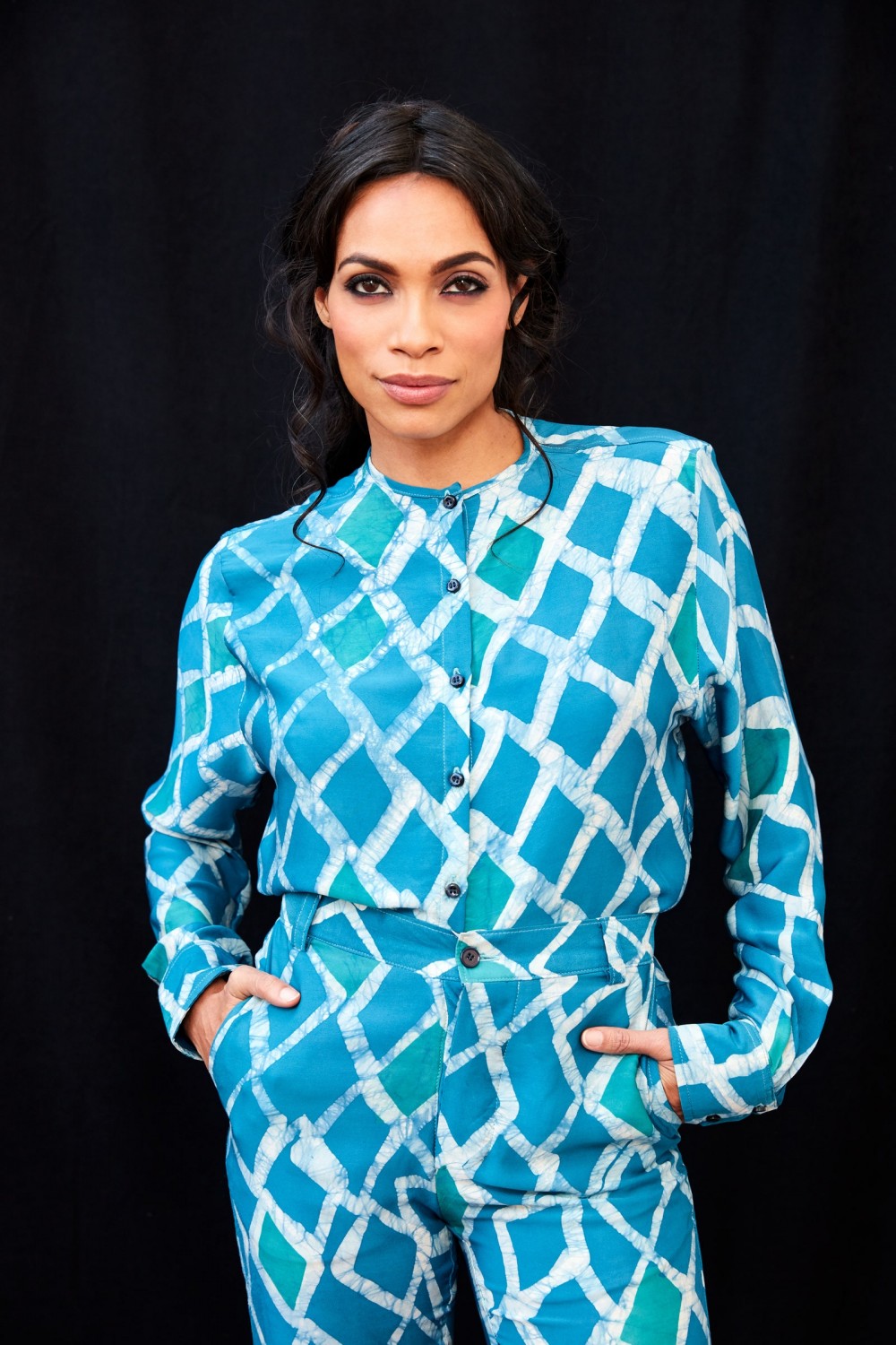 Image may contain Clothing Apparel Sleeve Long Sleeve Rosario Dawson Human Person Shirt Blouse and Female