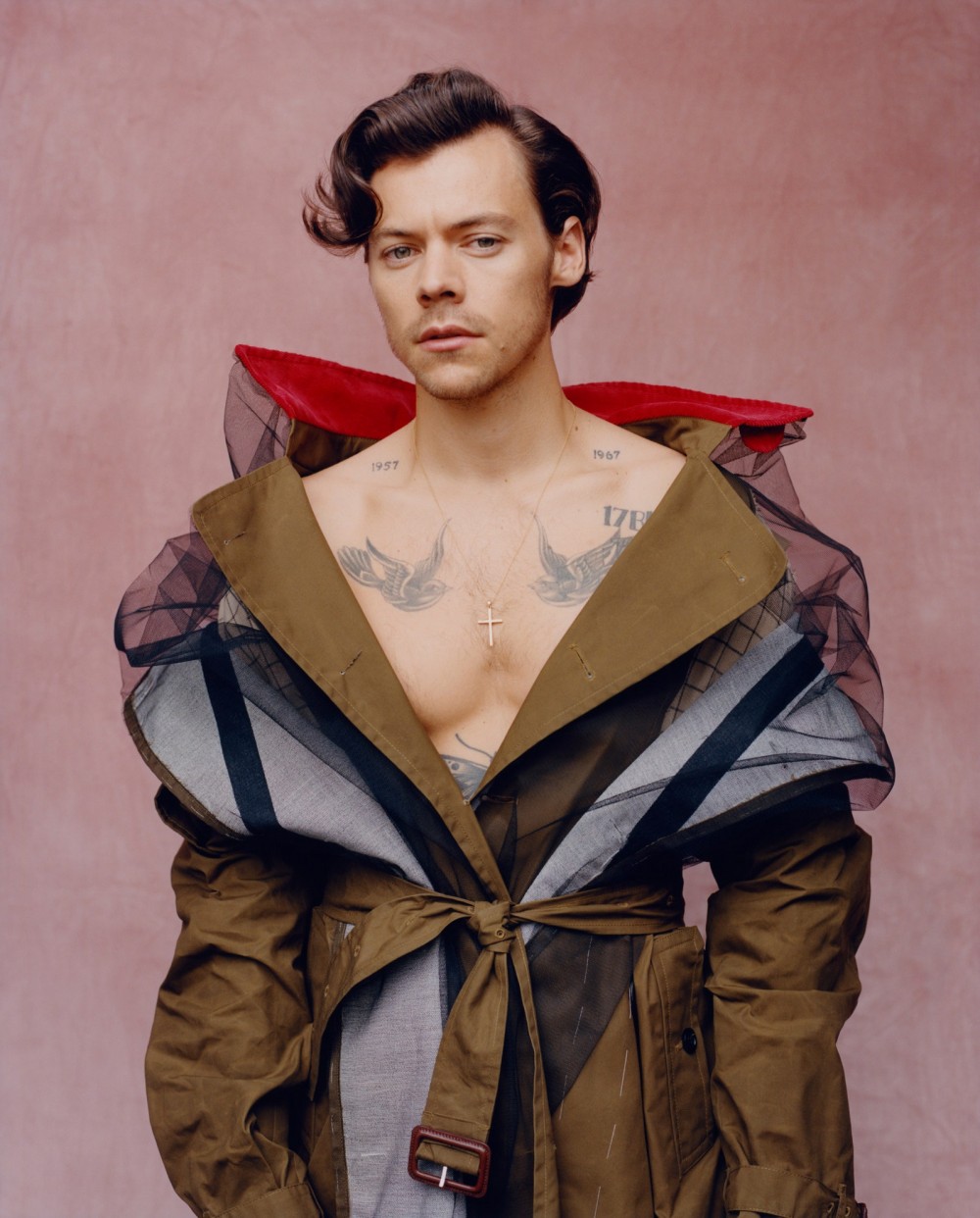 Image may contain Harry Styles Clothing Apparel Coat Human Person and Overcoat