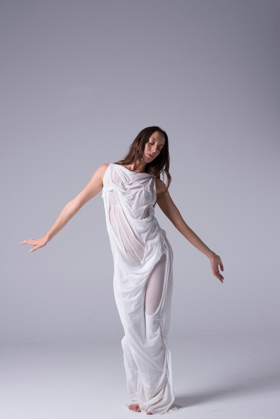 Image may contain Clothing Apparel Human Person Female Evening Dress Fashion Gown Robe and Dance Pose