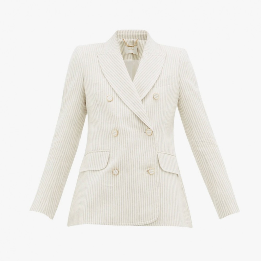 Image may contain: Clothing, Apparel, Suit, Overcoat, Coat, Jacket, Blazer, Tuxedo, and Man