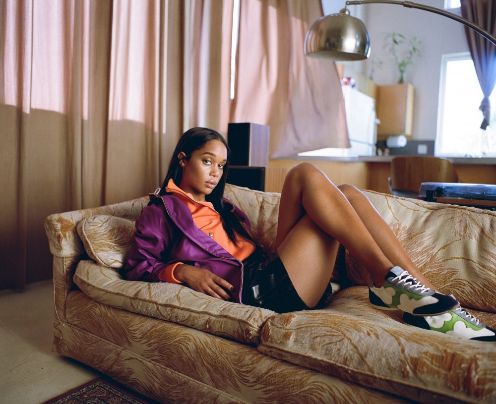 Image may contain Laura Harrier Furniture Couch Living Room Room Indoors Human and Person